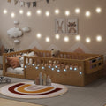 Children's bedroom with wooden bed, toys, and string lights.